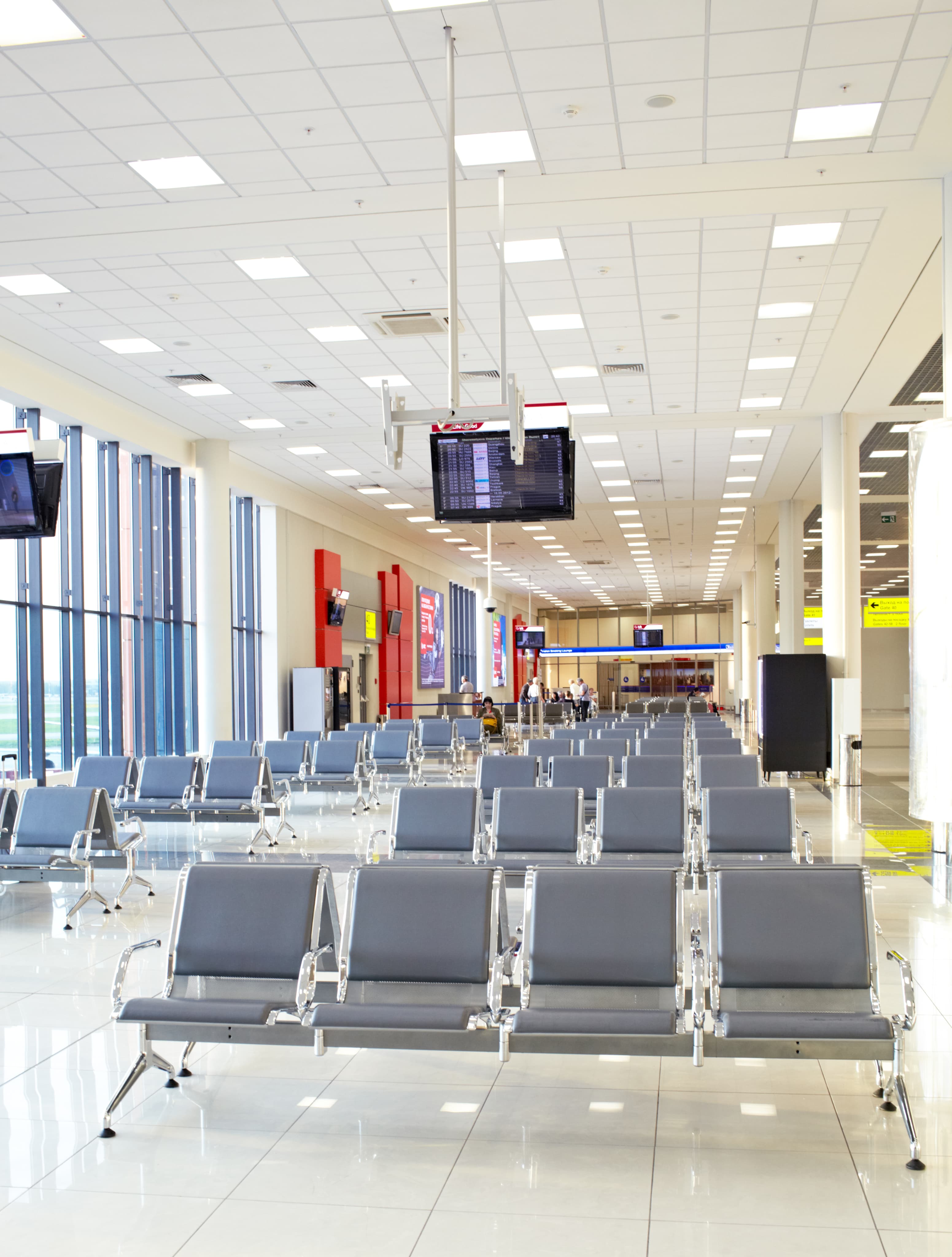 Airport waiting area with departure displays